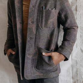 fit model with his hands in the pockets of The Ojai Jacket in Heathered Camo Wool