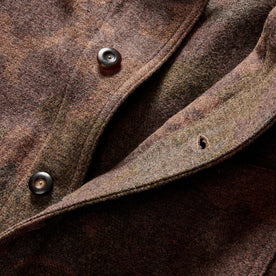 material shot of the dark horn buttons on The Ojai Jacket in Heathered Camo Wool