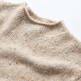 material shot of the mock neck collar on The Seafarer Sweater in Natural Donegal, Knits by Taylor Stitch