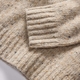 material shot of the ribbed cuffs on The Seafarer Sweater in Natural Donegal, Knits by Taylor Stitch