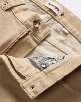 material shot of the zipper fly on The Slim All Day Pant in Light Khaki Broken Twill, Bottoms by Taylor Stitch