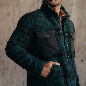 fit model showing the side of The Timberline Jacket in Dark Spruce Plaid