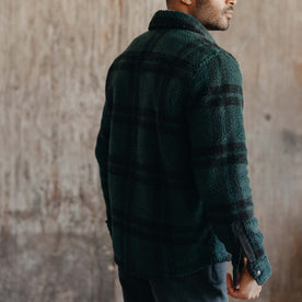 fit model showing the back of The Timberline Jacket in Dark Spruce Plaid