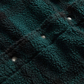 material shot of the buttons on The Timberline Jacket in Dark Spruce Plaid