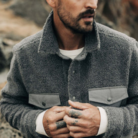 fit model buttoning The Timberline Jacket in Greystone Fleece