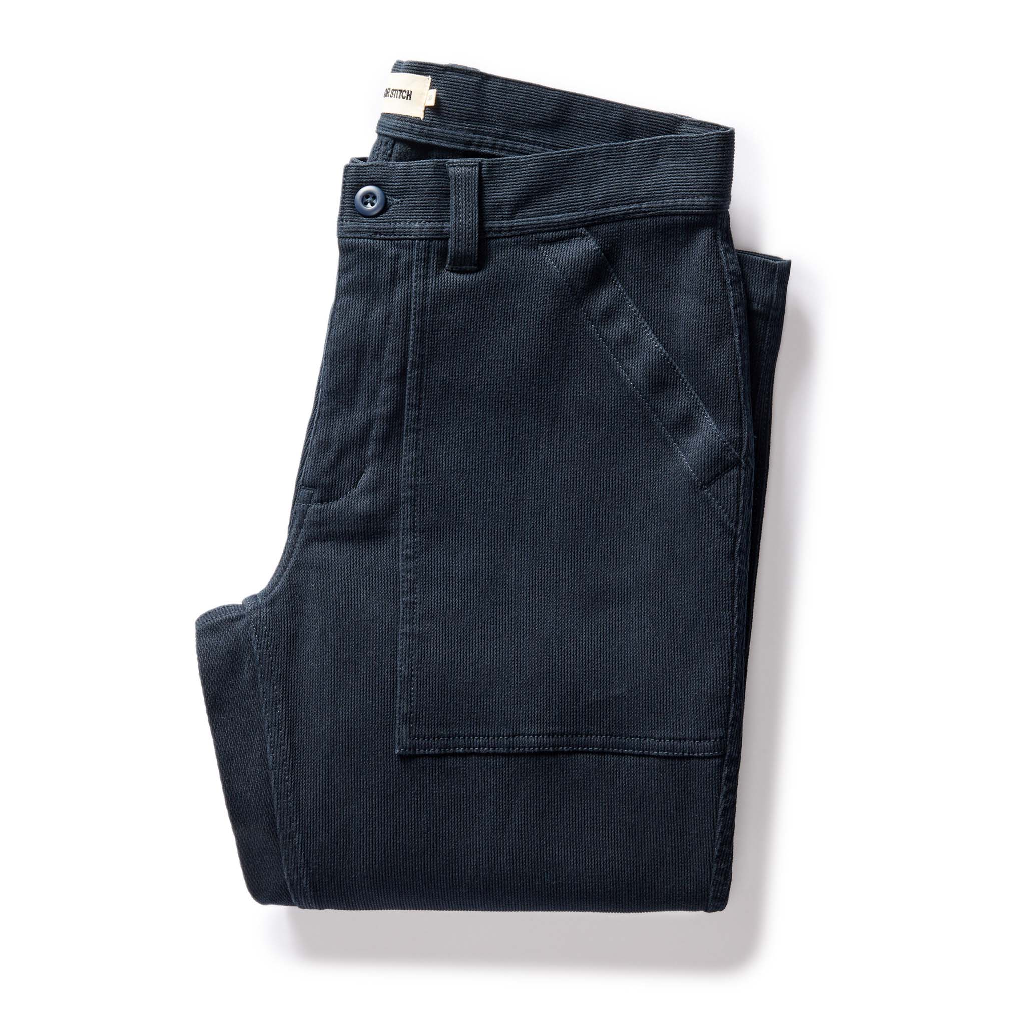 flatlay of The Trail Pant in Dark Navy Bedford Cord, Bottoms by Taylor Stitch
