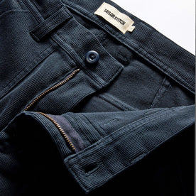 material shot of the zipper fly on The Trail Pant in Dark Navy Bedford Cord