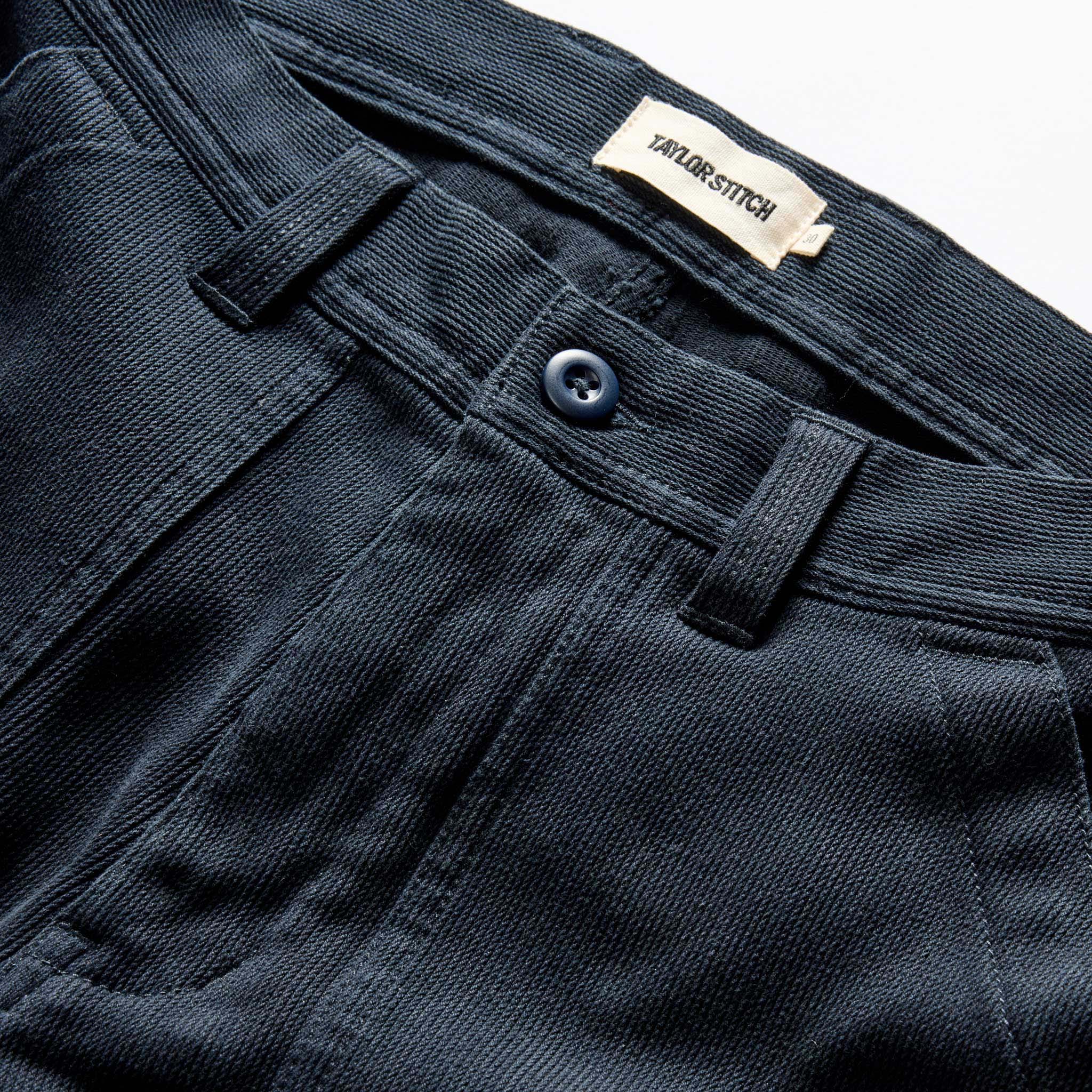 material shot of the button fly on The Trail Pant in Dark Navy Bedford Cord, Bottoms by Taylor Stitch