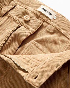 material shot of the zipper fly on The Trail Pant in Light Khaki Bedford Cord, Bottoms by Taylor Stitch