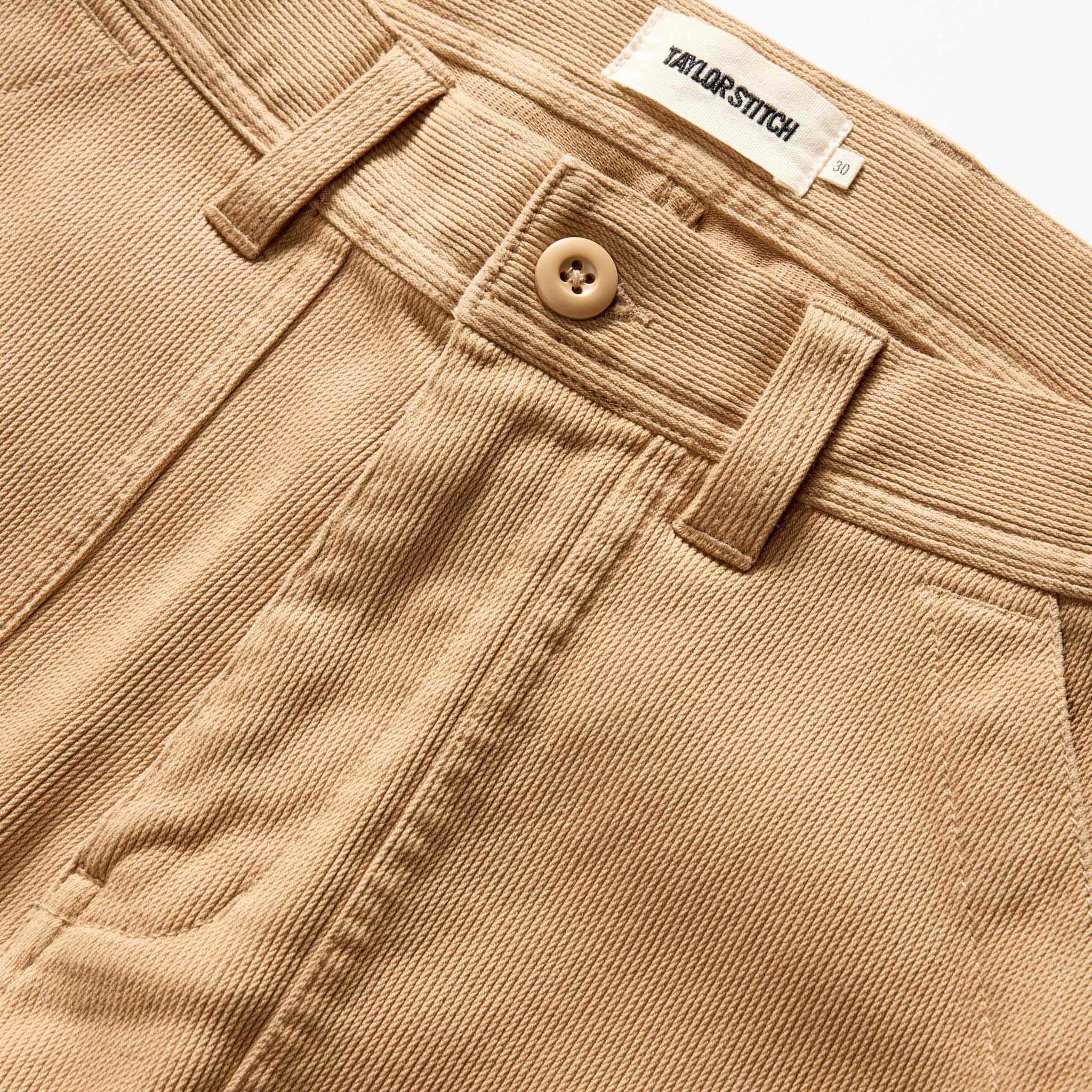 material shot of the button fly on The Trail Pant in Light Khaki Bedford Cord, Bottoms by Taylor Stitch