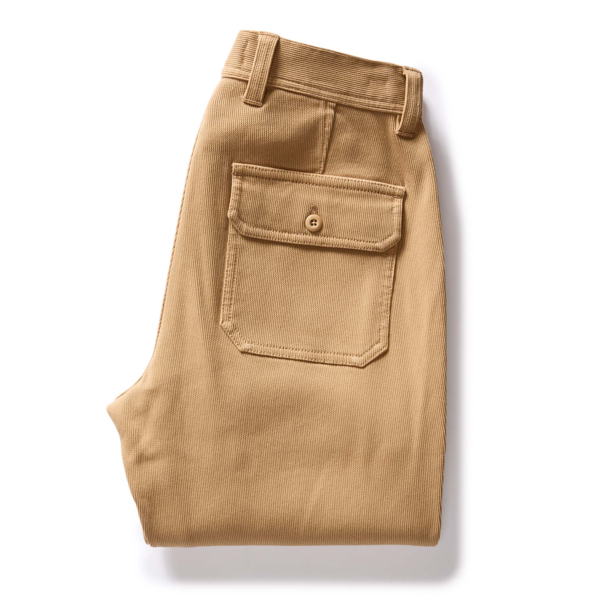 flatlay of The Trail Pant in Light Khaki Bedford Cord, folded from back, Bottoms by Taylor Stitch