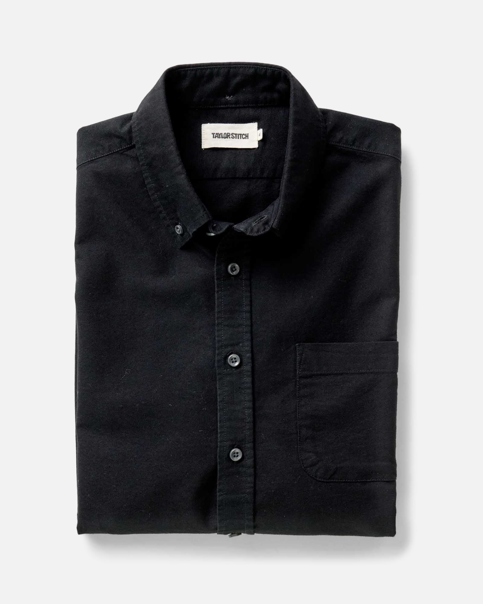 folded flatlay of The Jack in Black Indigo Oxford, Wovens by Taylor Stitch