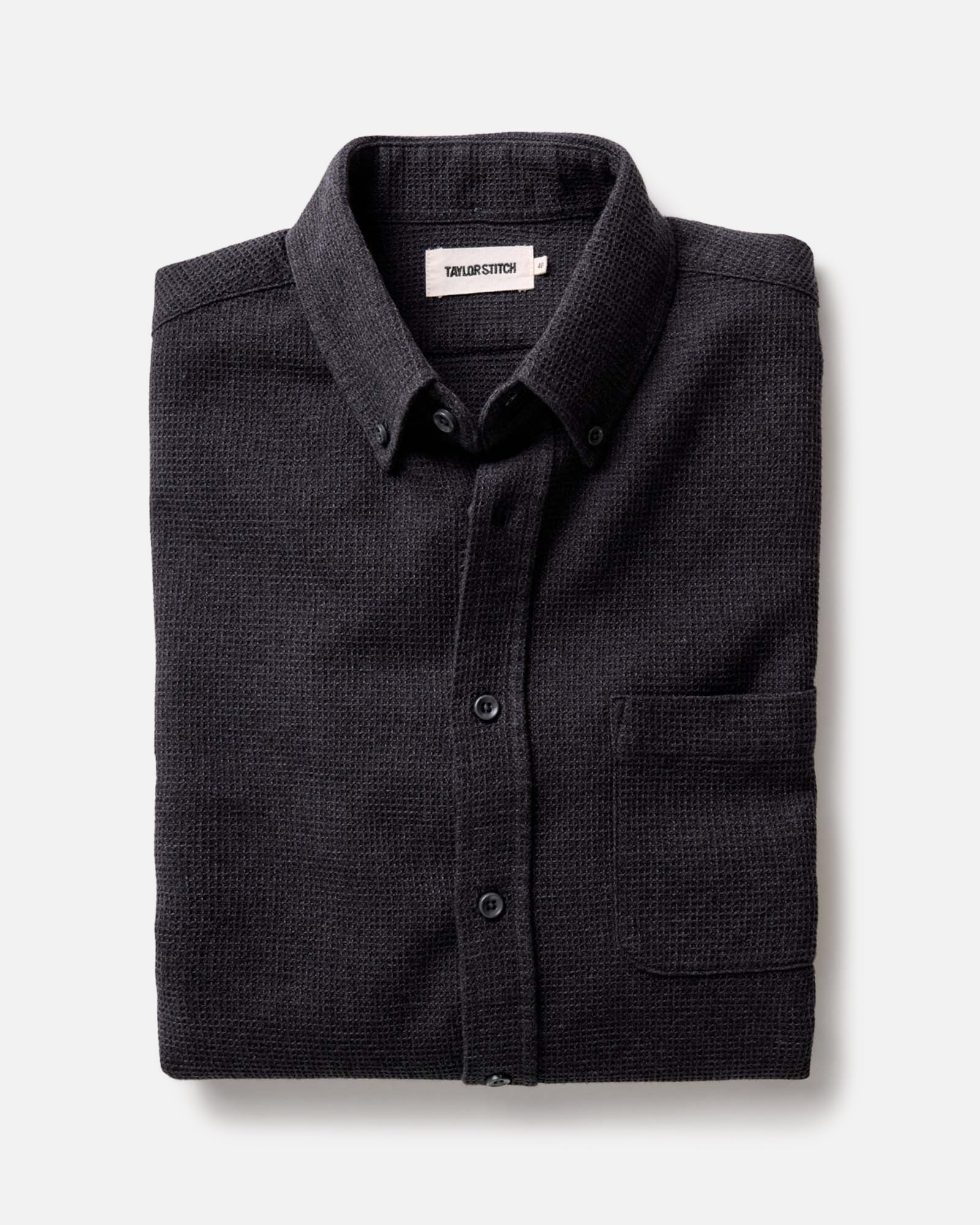folded flatlay of The Jack in Coal Waffle, Wovens by Taylor Stitch