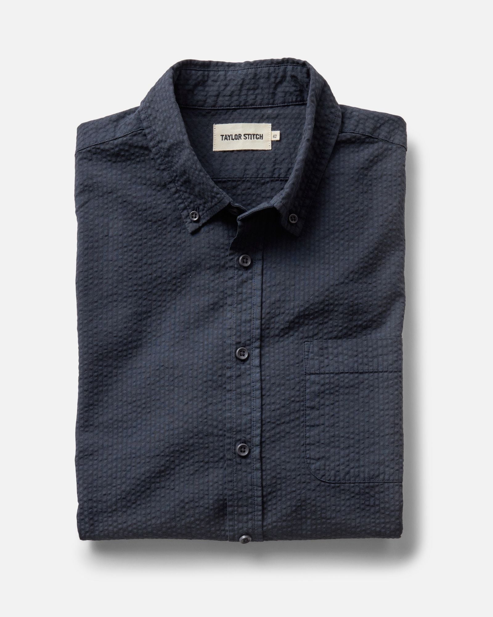 flatlay of The Jack in Dark Navy Seersucker, Wovens by Taylor Stitch