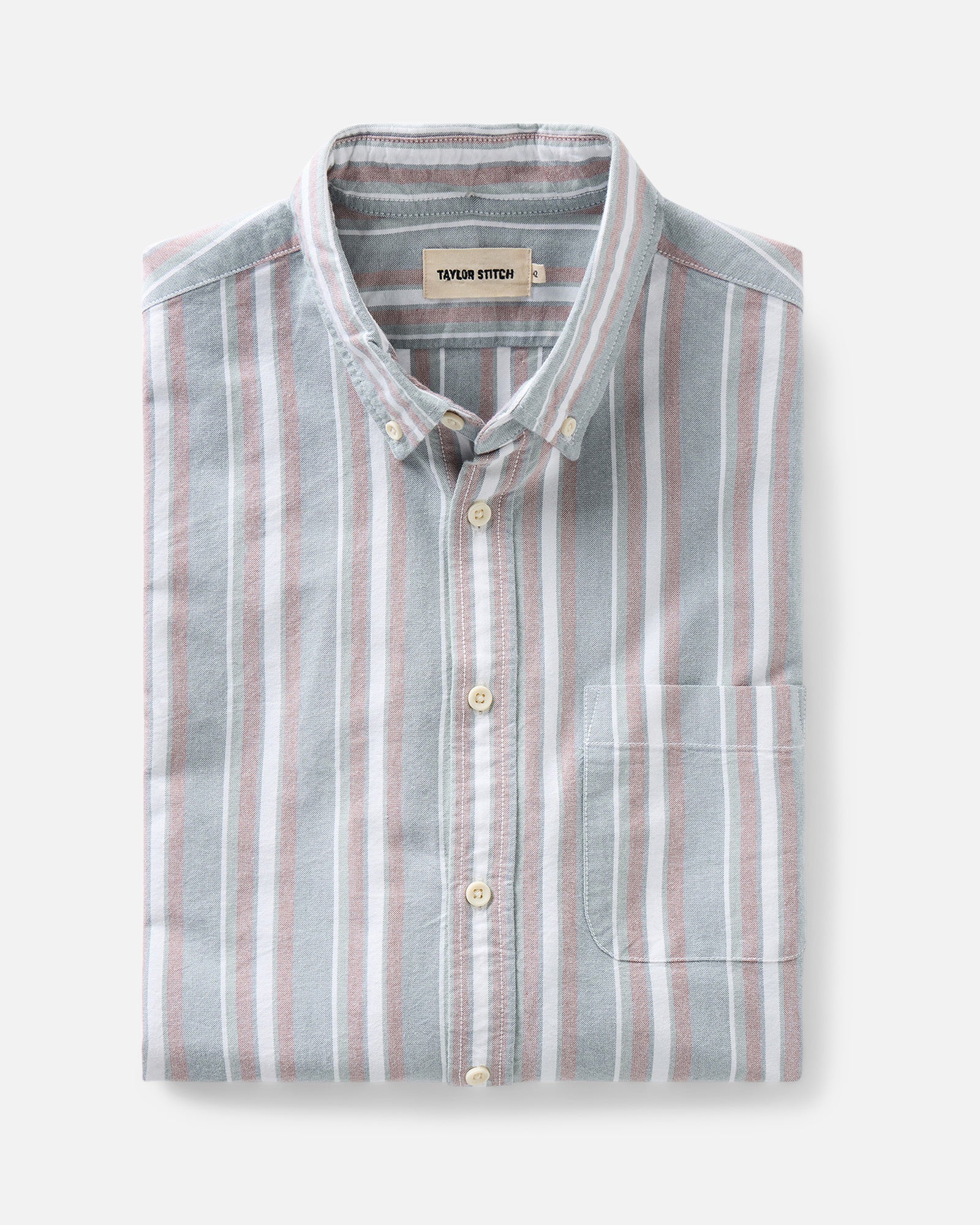 folded flatlay of The Jack in Daybreak Stripe Oxford, Wovens by Taylor Stitch