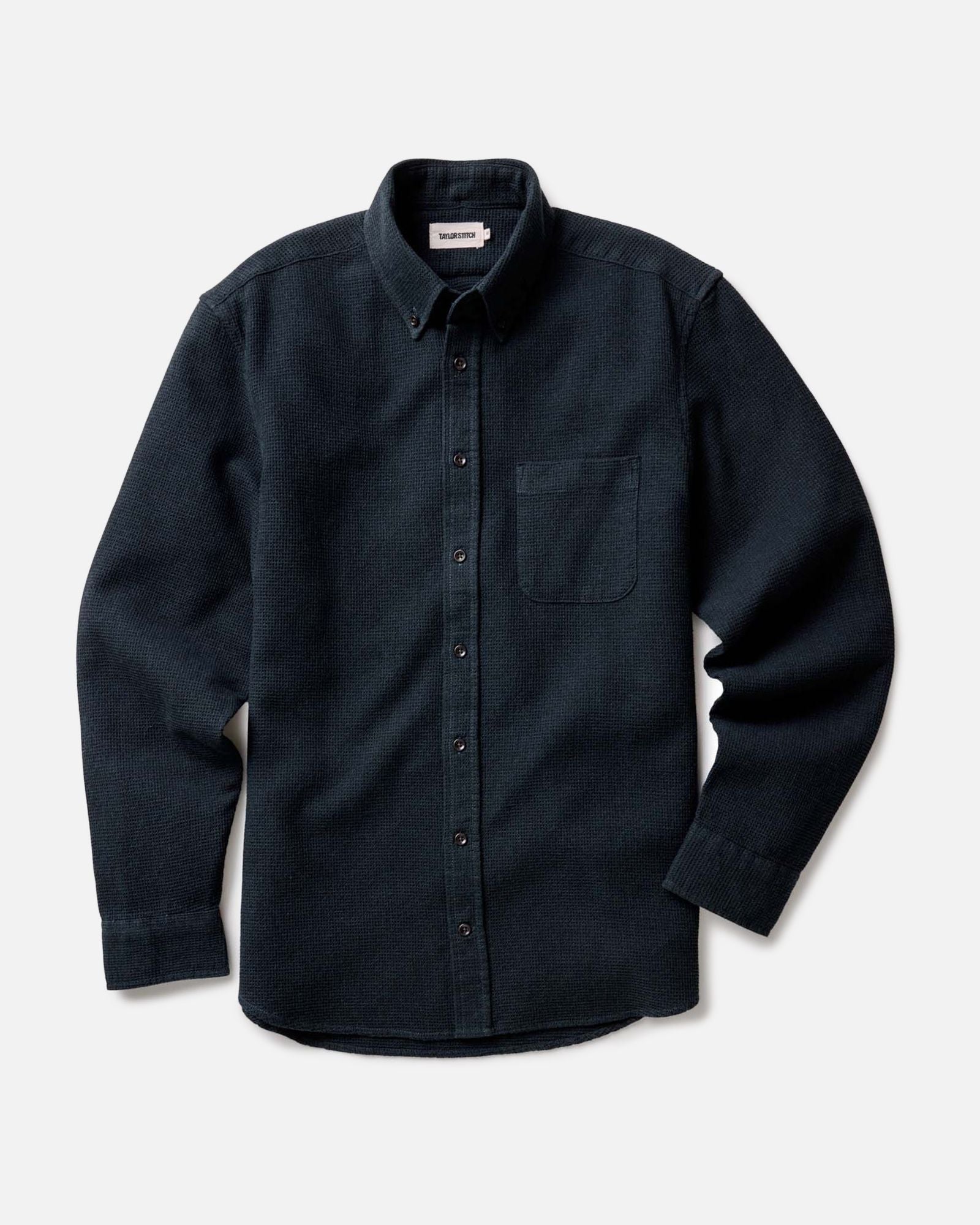 fit model sitting in The Jack in Forest Waffle, Wovens by Taylor Stitch