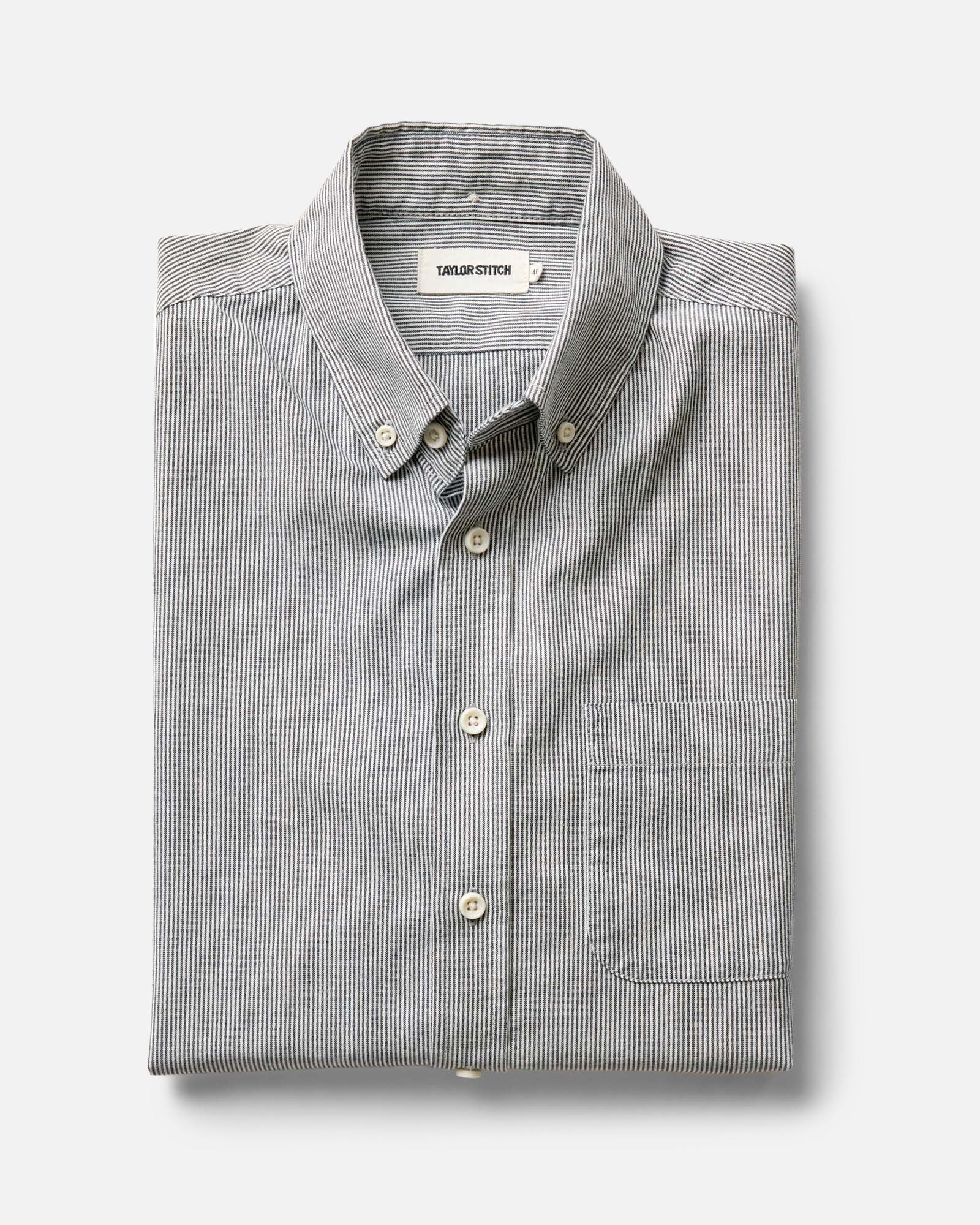 folded flatlay of The Jack in Rinsed Indigo Stripe Chambray, Wovens by Taylor Stitch