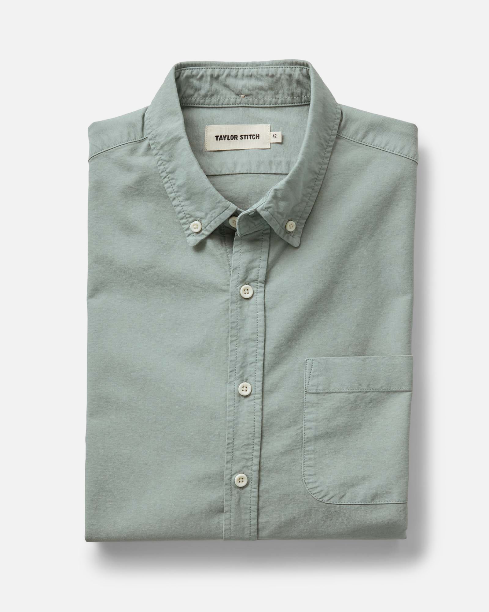 folded flatlay of The Jack in Surf Green Oxford, Wovens by Taylor Stitch