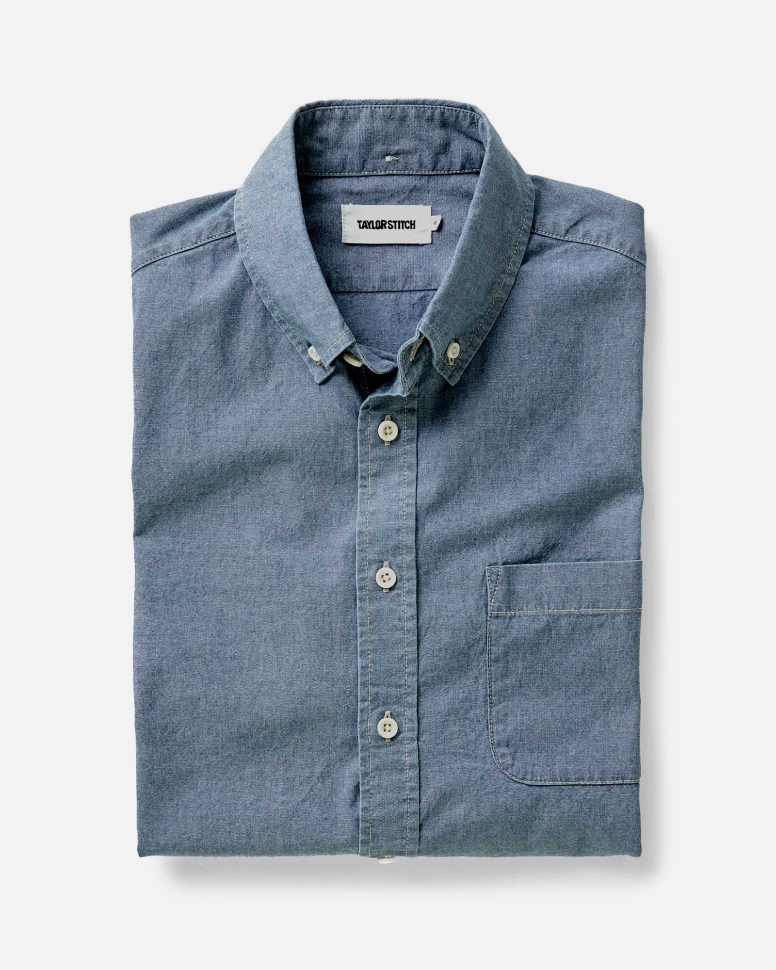 folded flatlay of The Jack in Washed Indigo Chambray, Wovens by Taylor Stitch