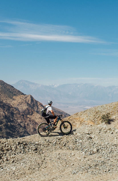 Mountainbiking, taking in the views.