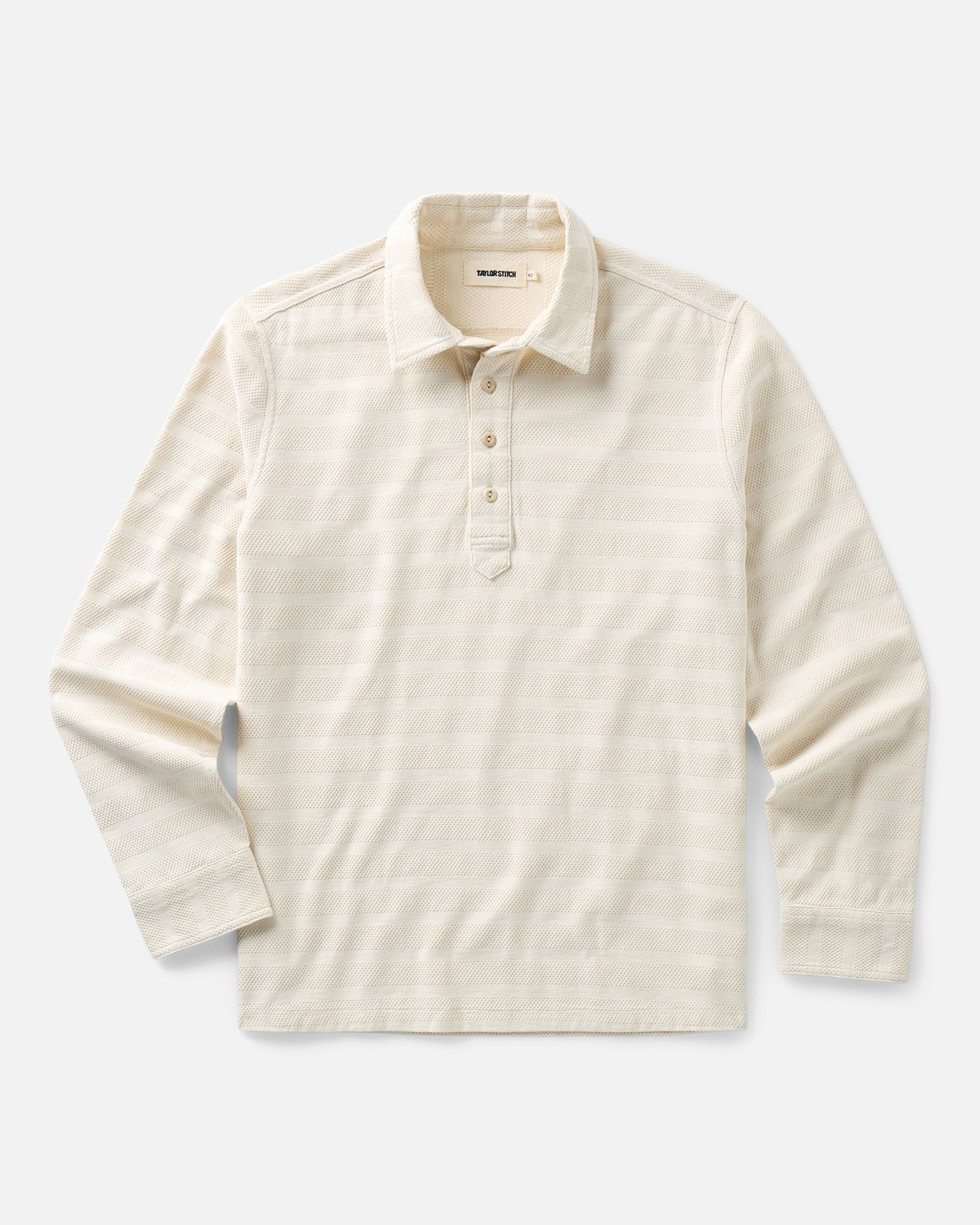 flatlay of The Long Sleeve Polo in Vintage White Knit Stripe, Knits by Taylor Stitch