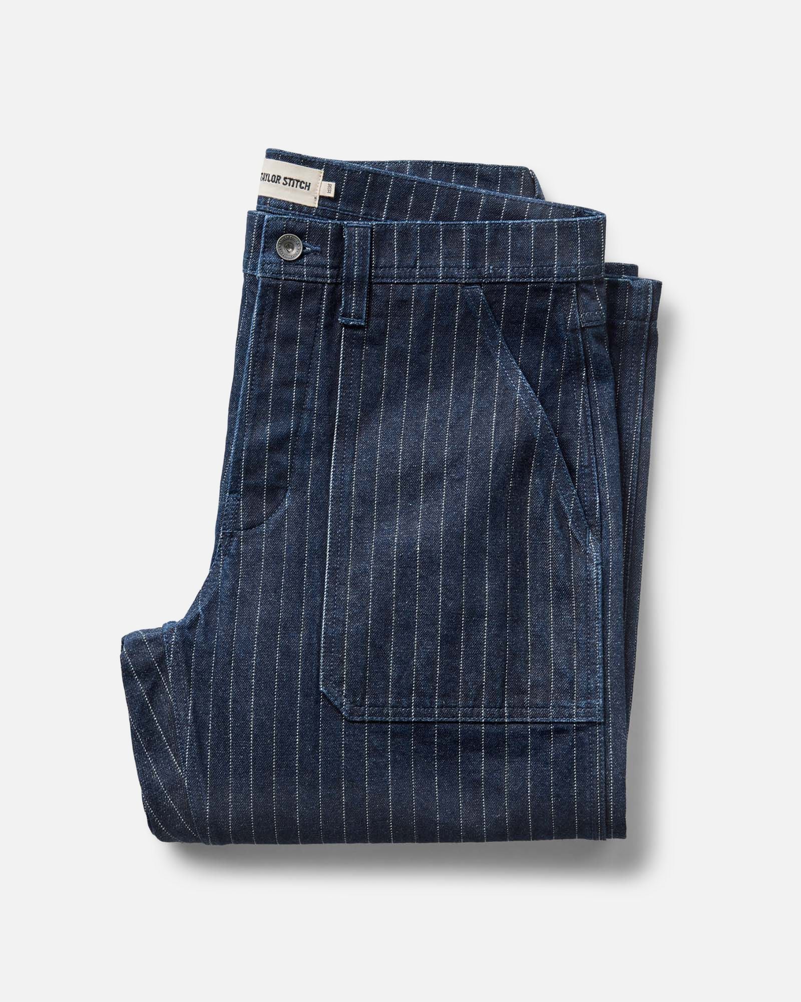 folded flatlay of The Mariner Jean in Rinsed Indigo Dobby Denim, Bottoms by Taylor Stitch