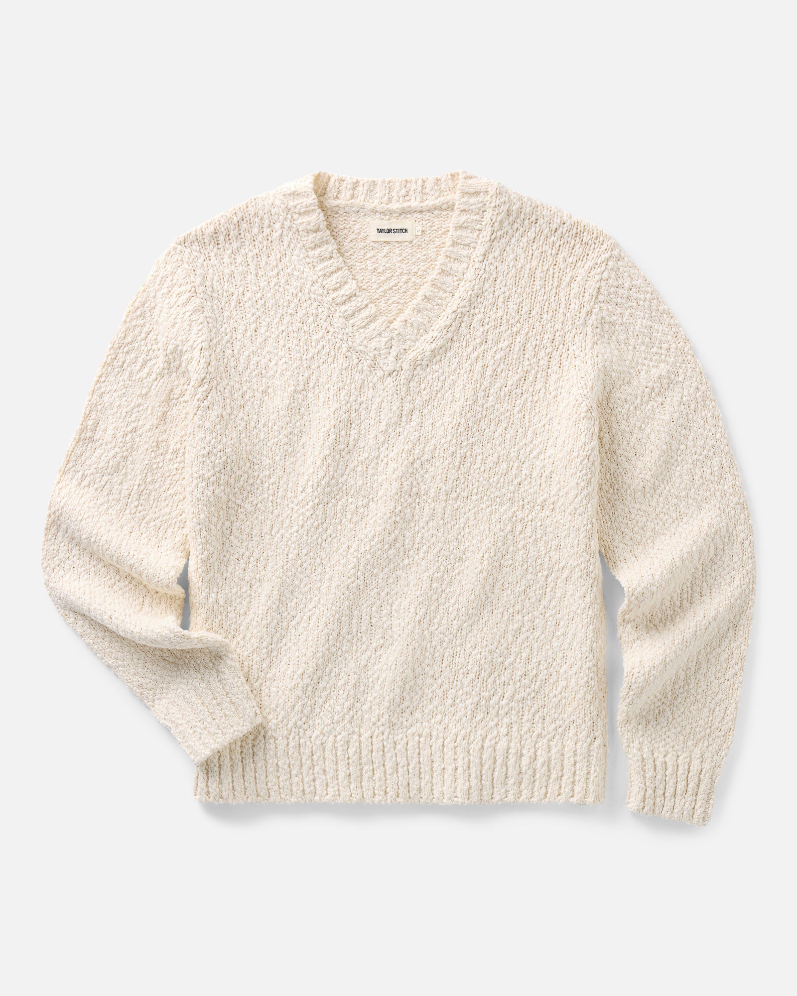 flatlay of The Match V-Neck Sweater in Vintage White Slub, Sweaters by Taylor Stitch