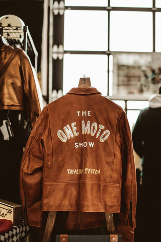 The One Moto Show-printed leather jackets hanging in the TS booth.