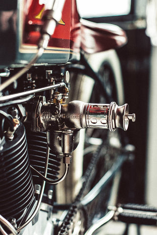 Tightly focused shot showing engine detail on a vintage motorcycle.