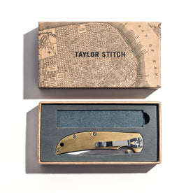 The Drop Point Knife in Brass in a box