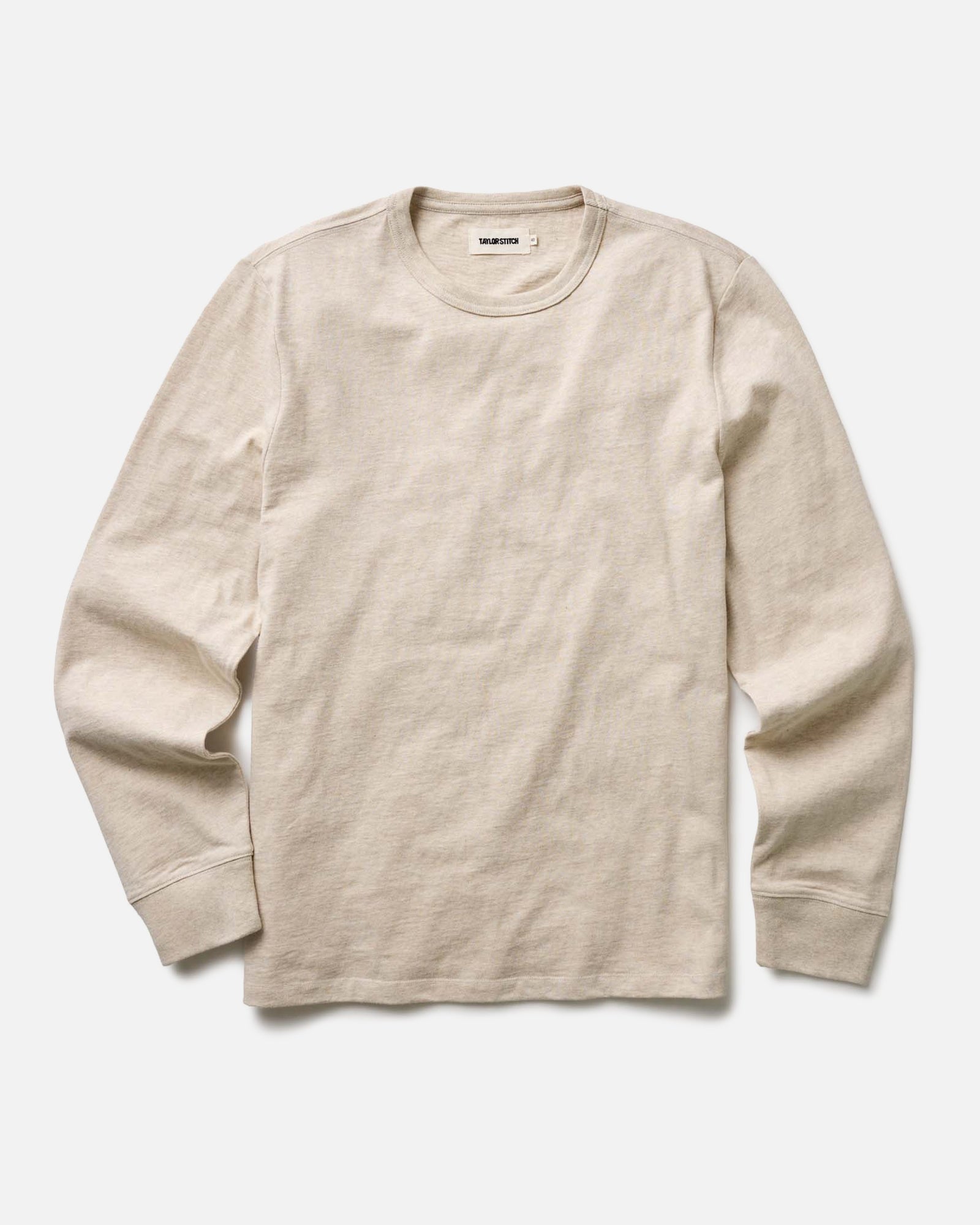 flatlay of The Organic Cotton Long Sleeve Tee in Heather Oat, Knits by Taylor Stitch