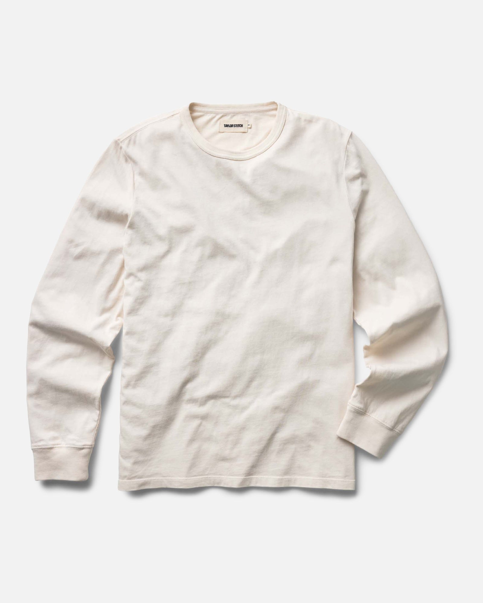 flatlay of The Organic Cotton Long Sleeve Tee in Vintage White, Knits by Taylor Stitch