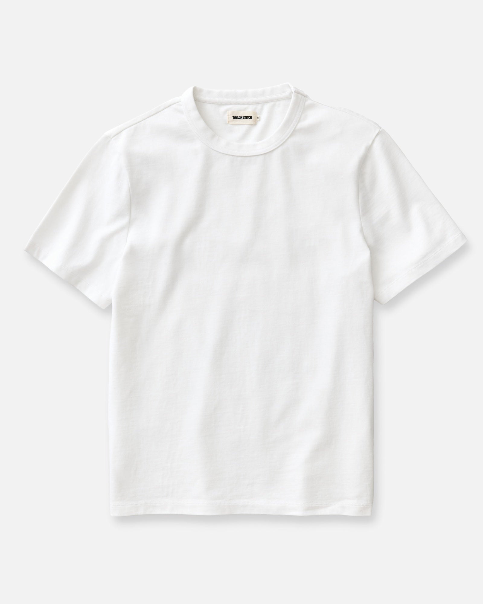 flatlay of The Organic Cotton Shop Tee in White, Knits by Taylor Stitch