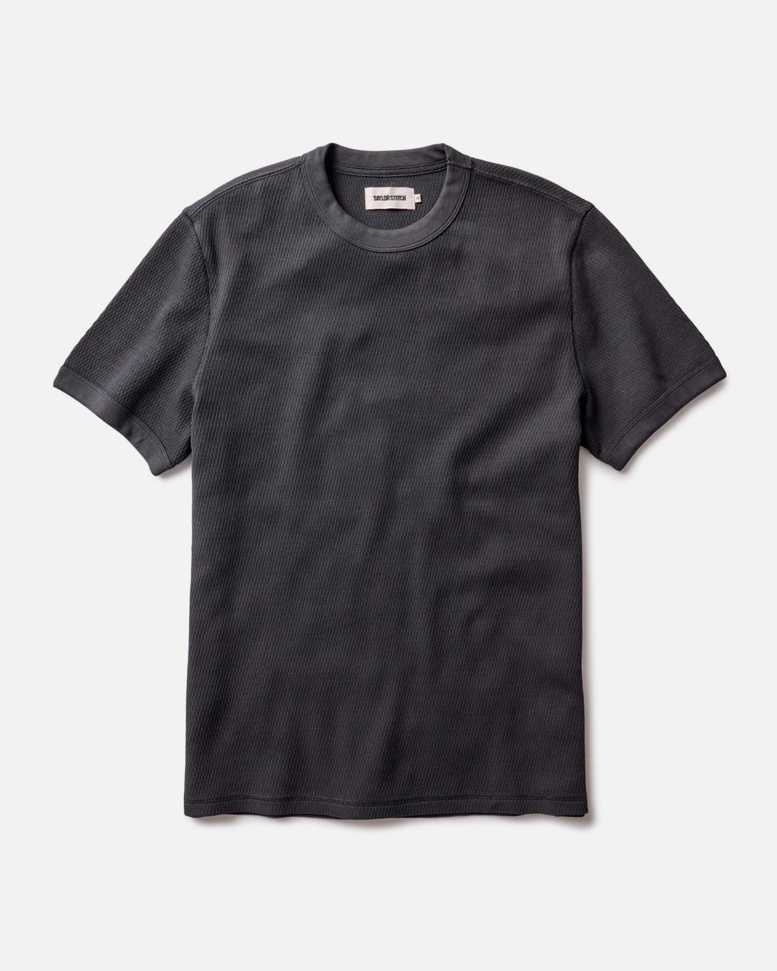 flatlay of The Organic Cotton Short Sleeve Crew in Faded Black Waffle, Knits by Taylor Stitch