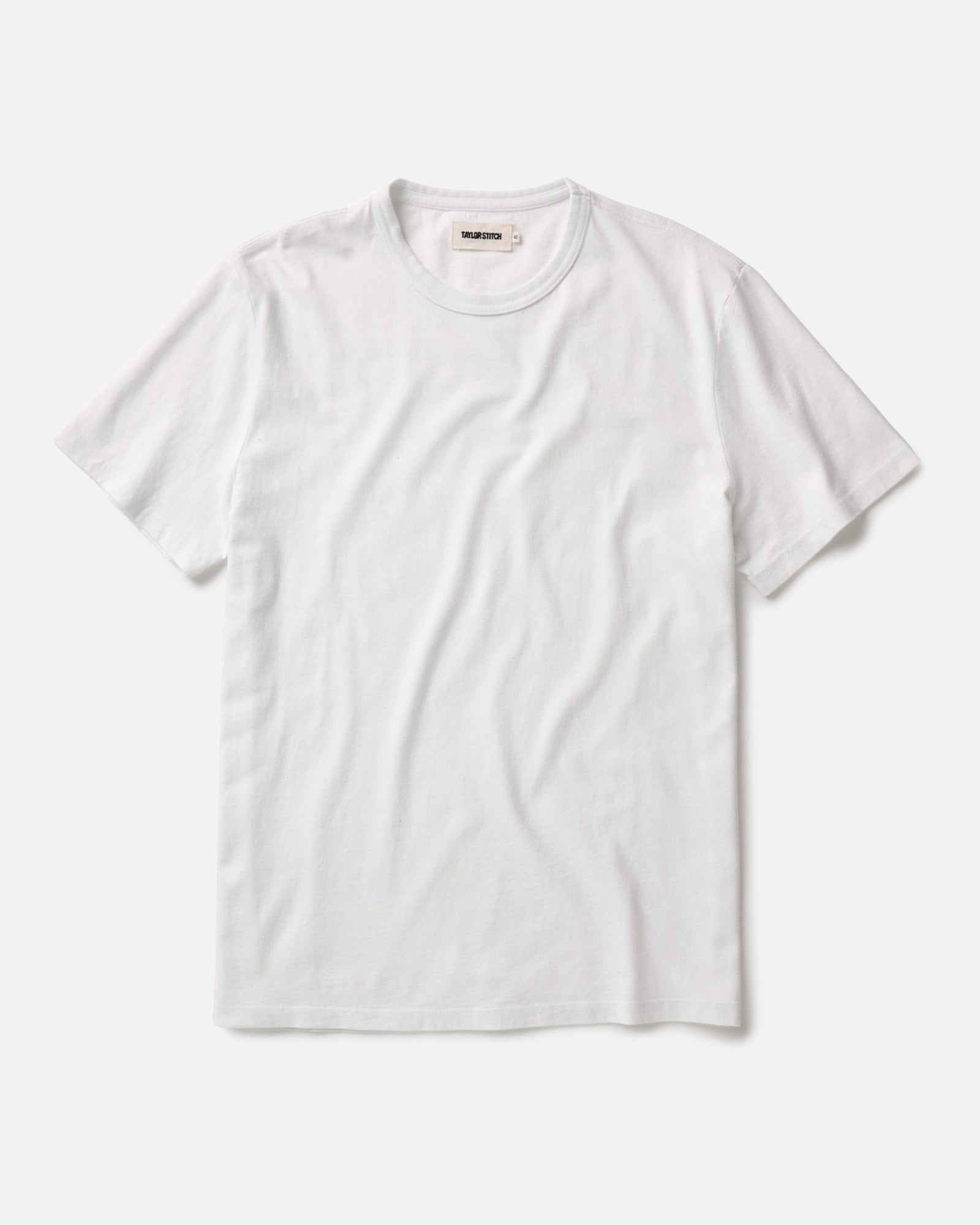 flatlay of The Organic Cotton Tee in White, Knits by Taylor Stitch