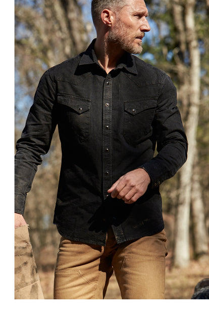 chard rocking the western in black selvage chambray with some chore pants—looking right in the woods