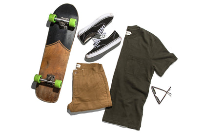 The Heavy Bag Tee with The Camp Pant, sneakers and a skateboard