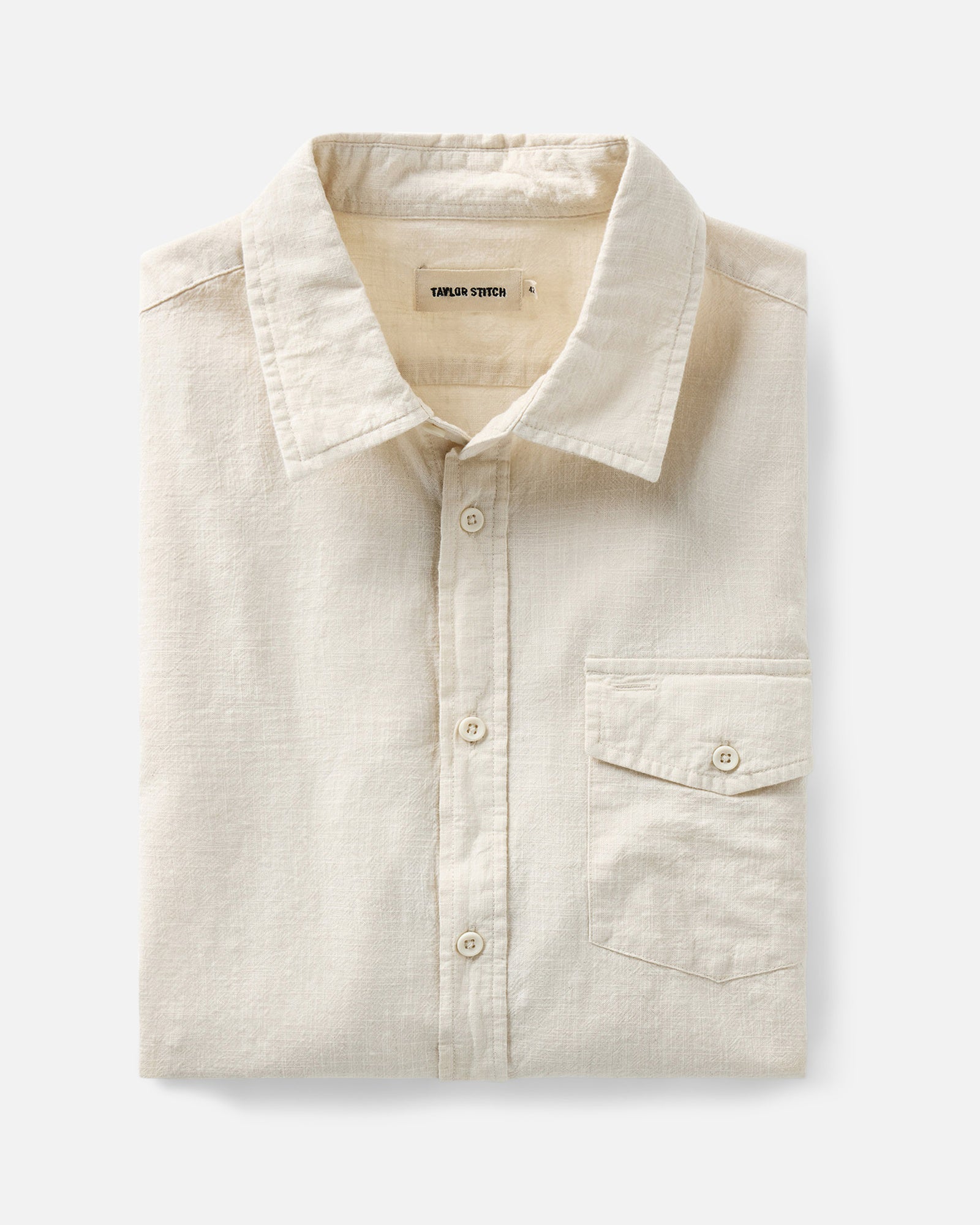 folded flatlay of The Quincy Shirt in Vintage White Slub, Wovens by Taylor Stitch