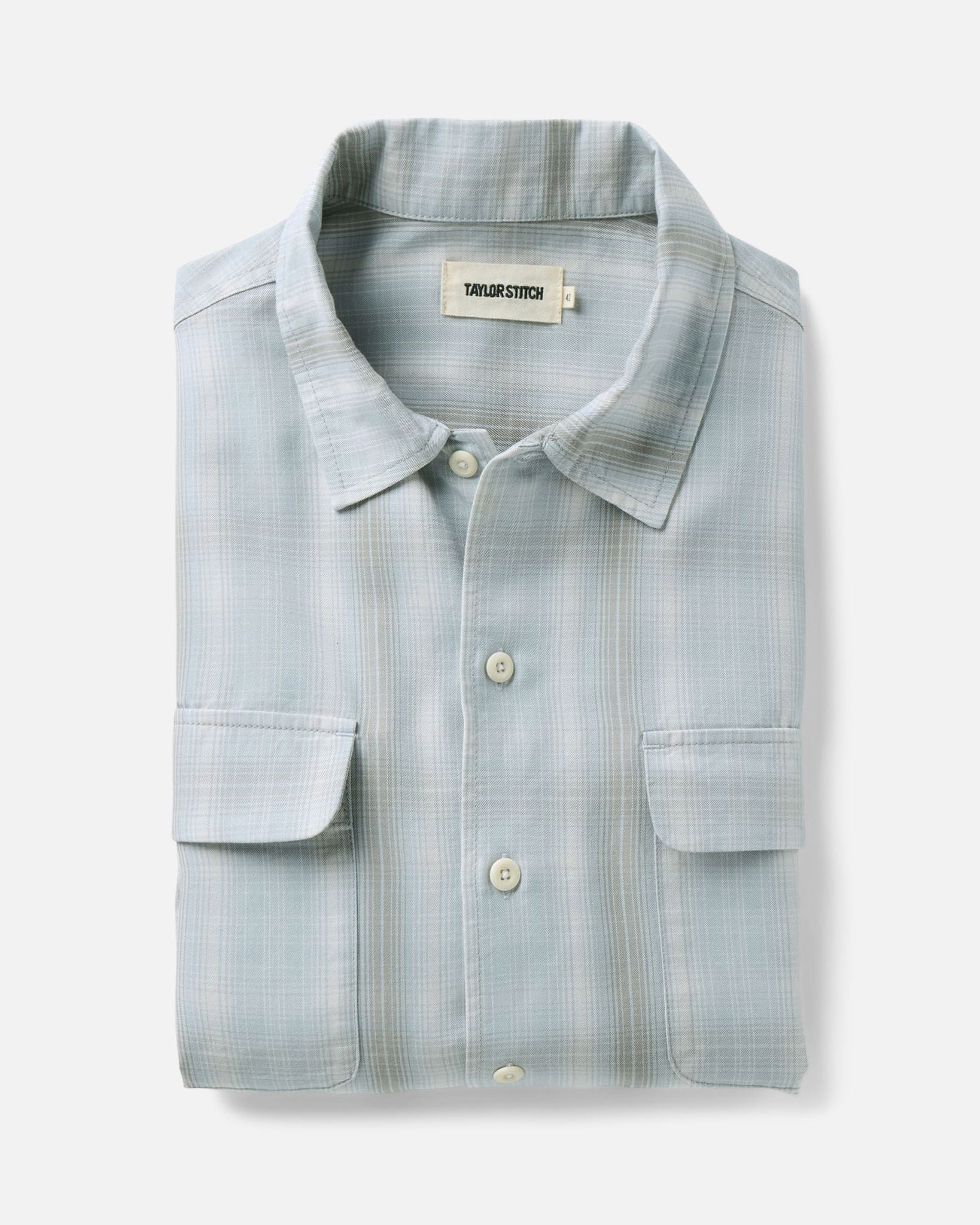 folded flatlay of The Shore Shirt in Fog Check Tencel, Wovens by Taylor Stitch