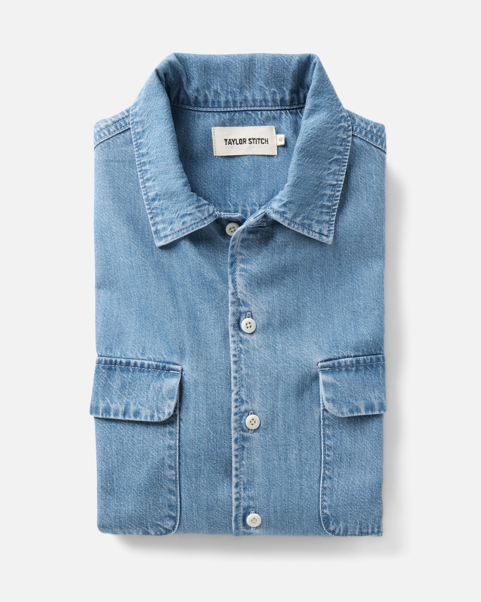folded flatlay of The Shore Shirt in Washed Indigo Twill, Wovens by Taylor Stitch