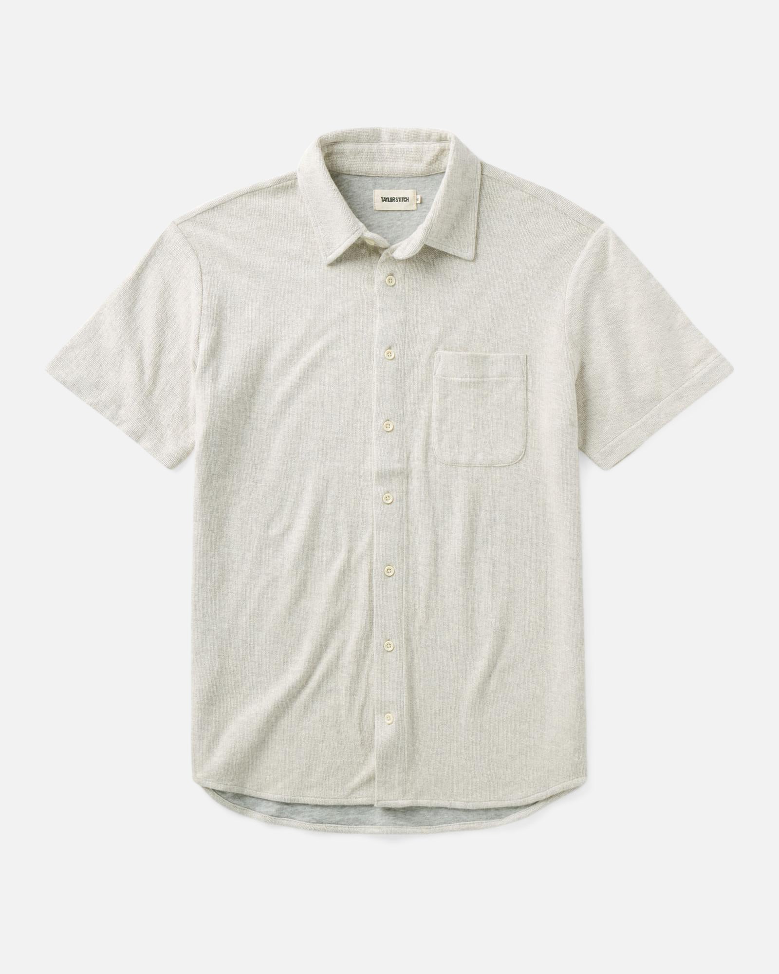 flatlay of The Short Sleeve California in Heather Oat Double Knit, Knits by Taylor Stitch