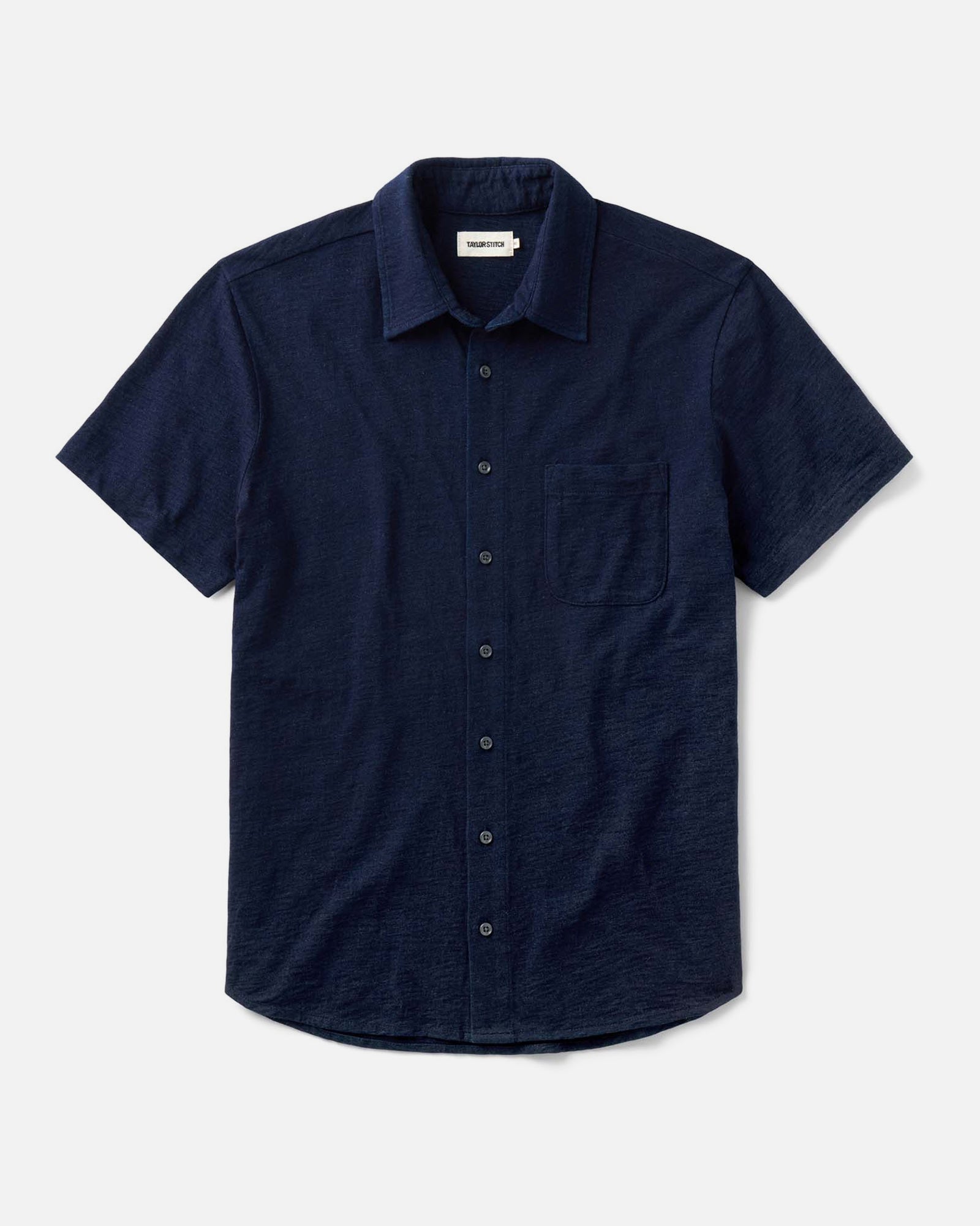 flatlay of The Short Sleeve California in Rinsed Indigo Slub, Knits by Taylor Stitch