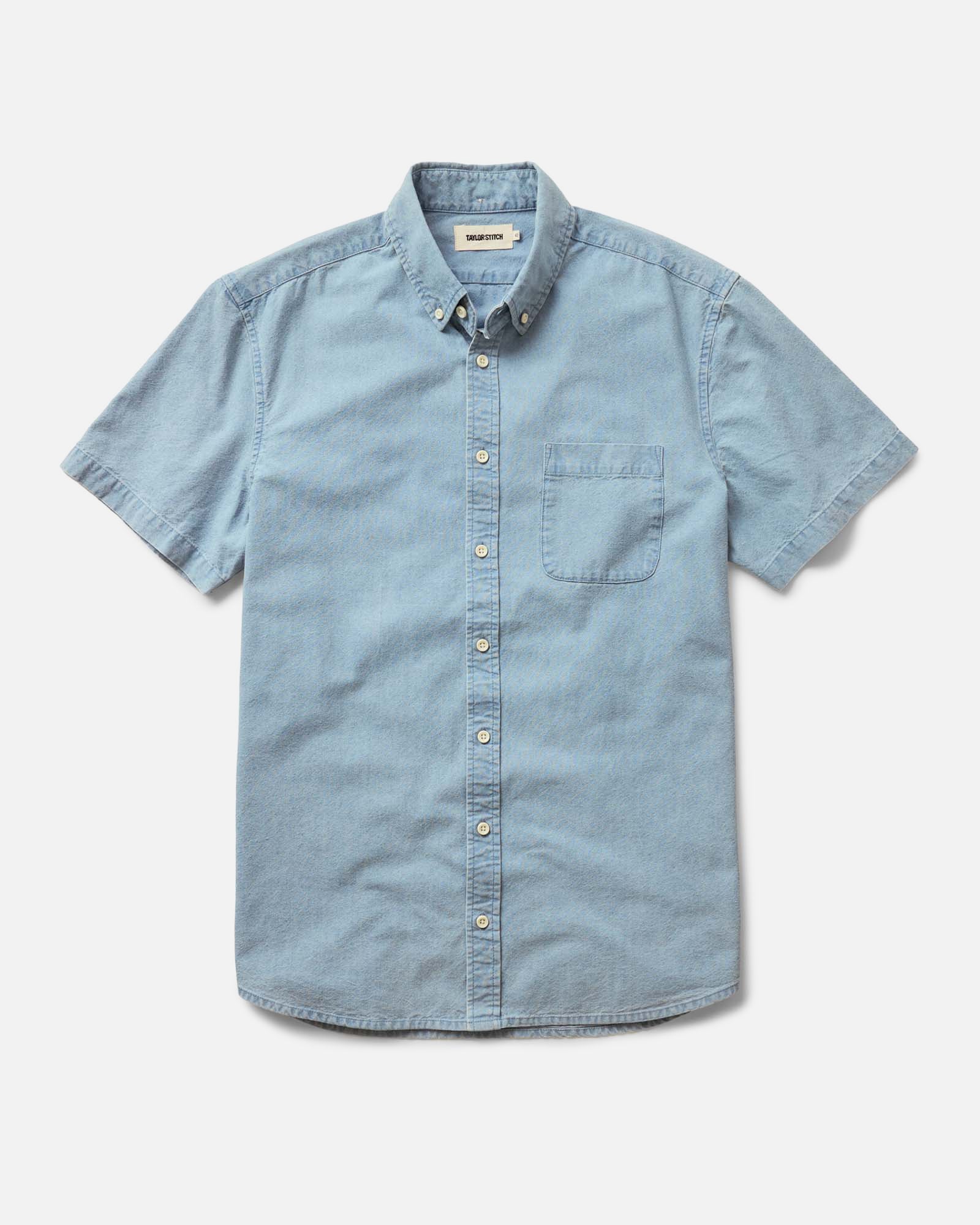 flatlay of The Short Sleeve Jack in Washed Indigo Oxford, Wovens by Taylor Stitch