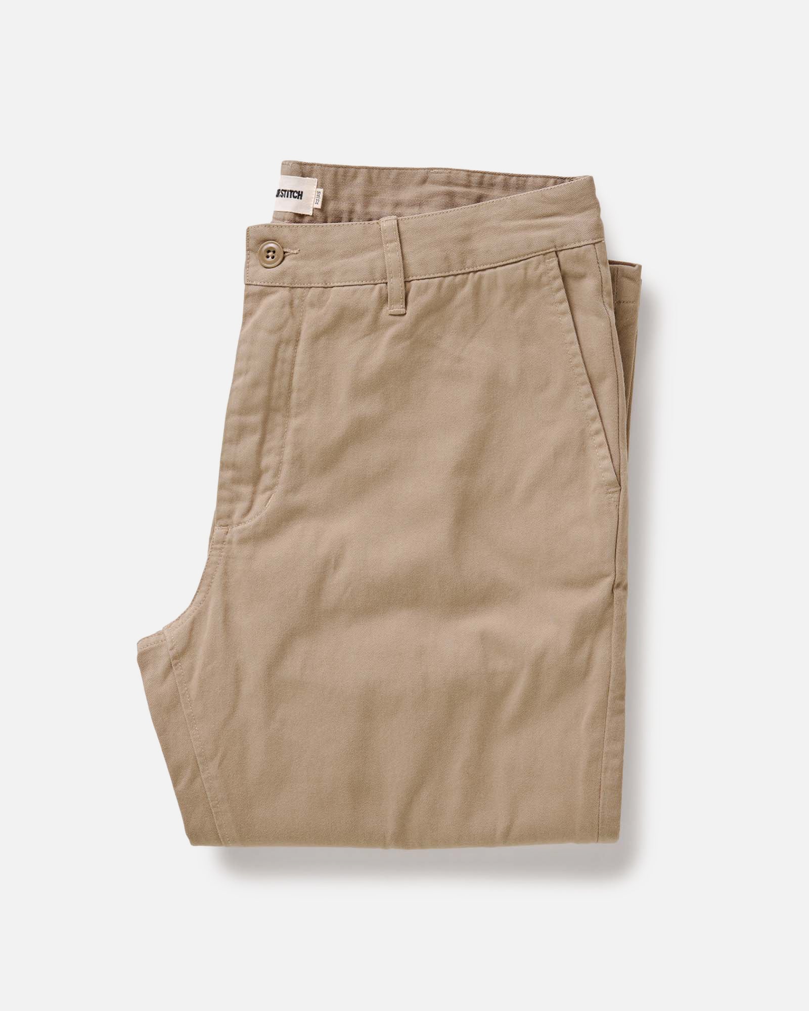 folded flatlay of The Slim Foundation Pant in Organic Khaki, Bottoms by Taylor Stitch