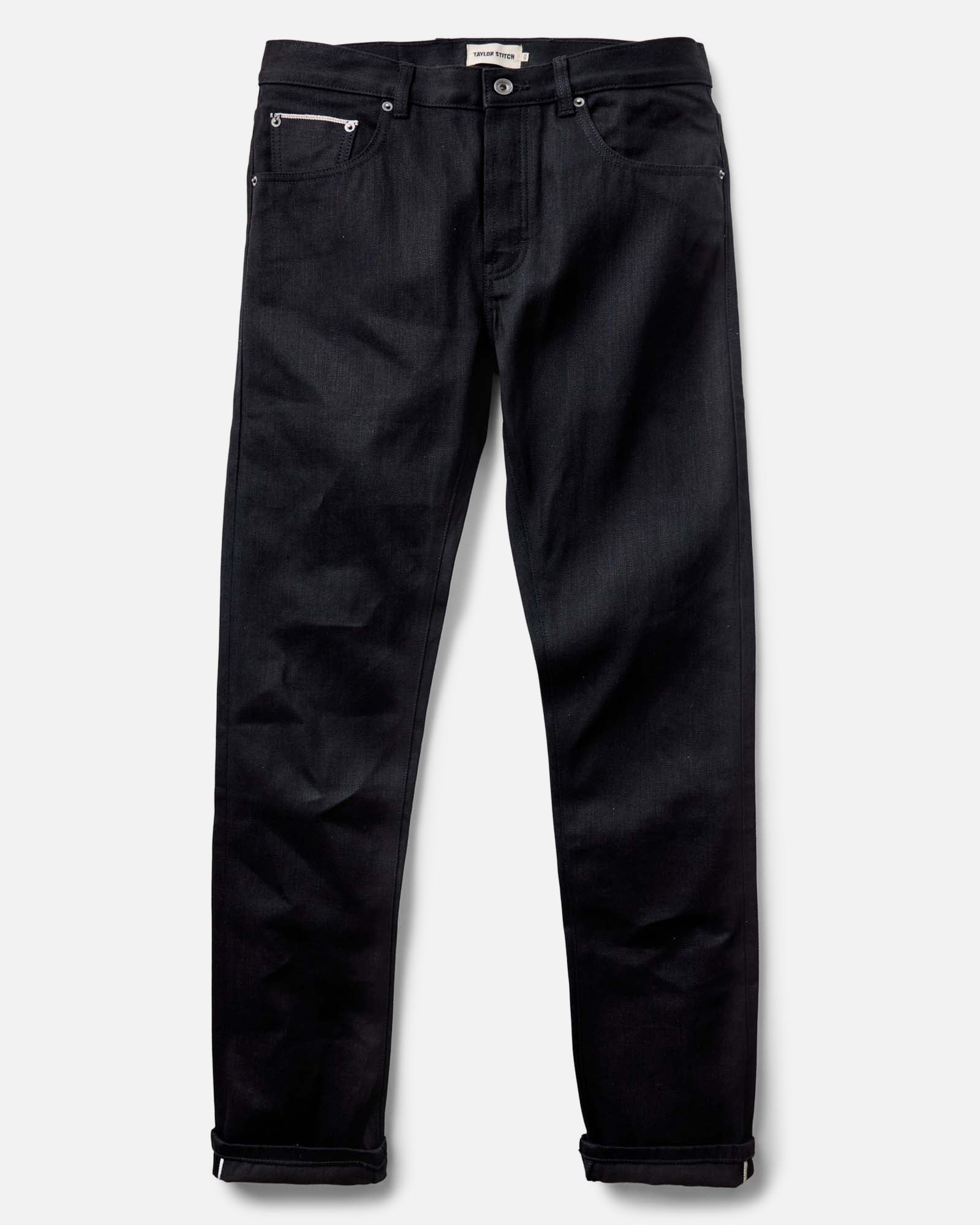 flatlay of The Slim Jean in Rigid Black Organic Selvedge, Bottoms by Taylor Stitch
