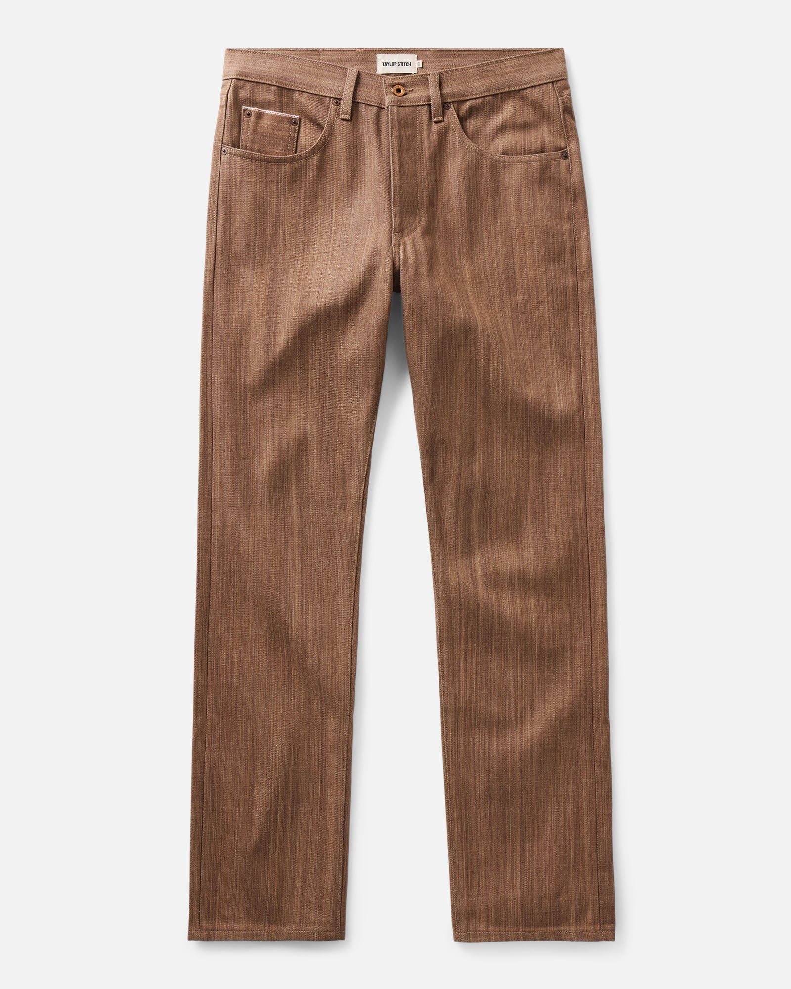 flatlay of The Straight Jean in Kakishibu Selvedge, Bottoms by Taylor Stitch