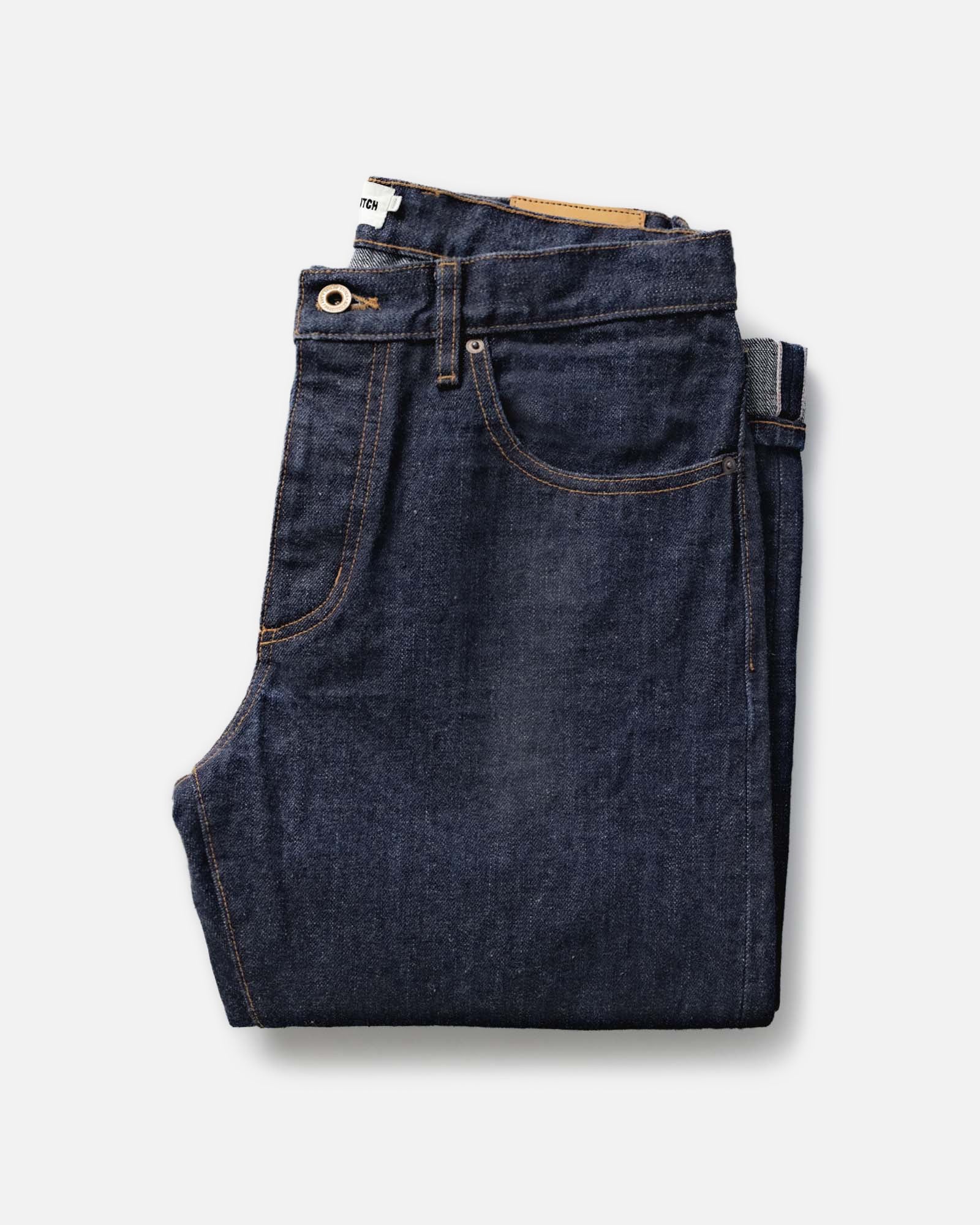 folded flatlay of The Straight Jean in Rinsed Yoshiwa Selvedge, Bottoms by Taylor Stitch