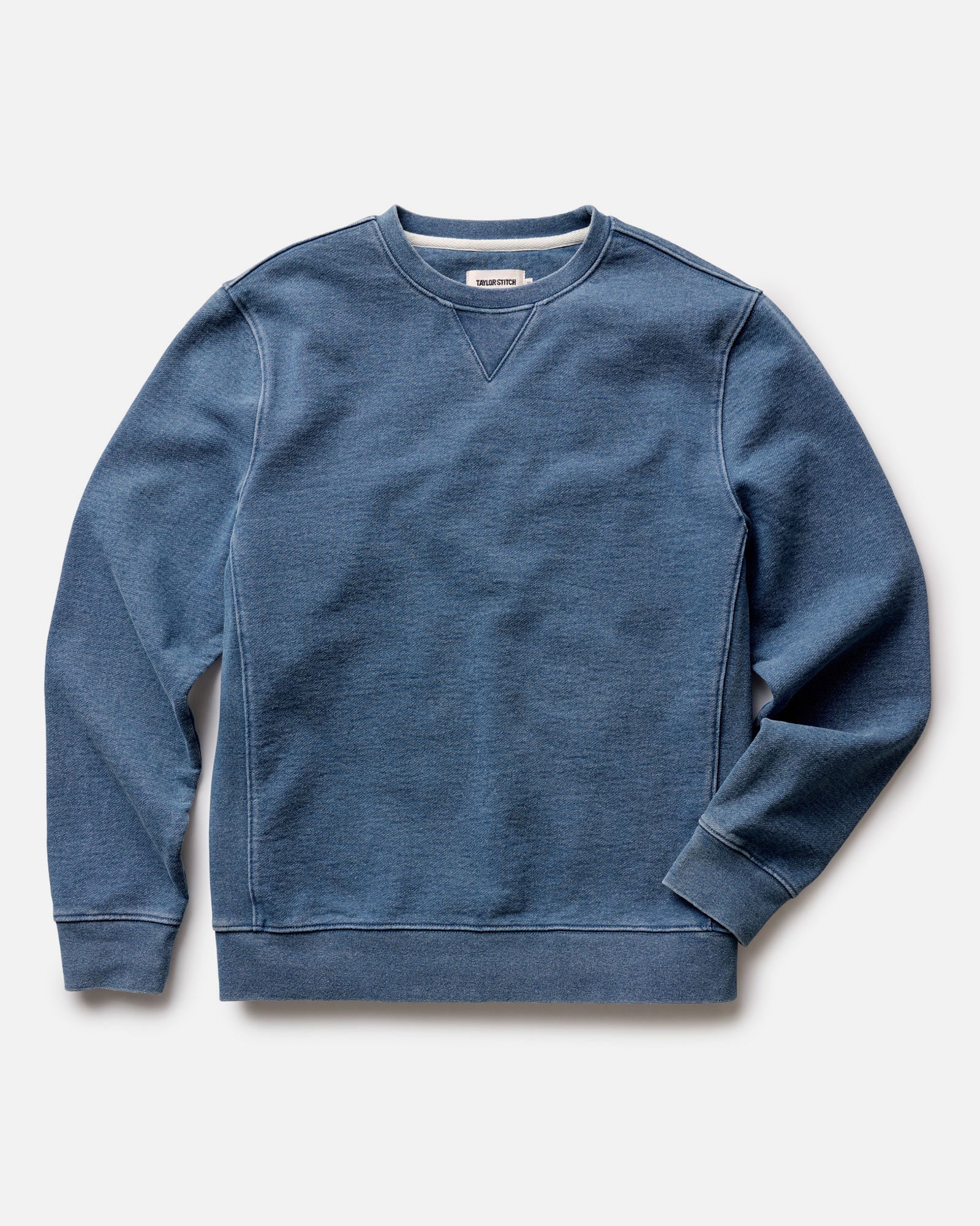 flatlay of The Apres Crew in Washed Indigo Terry, Knits by Taylor Stitch