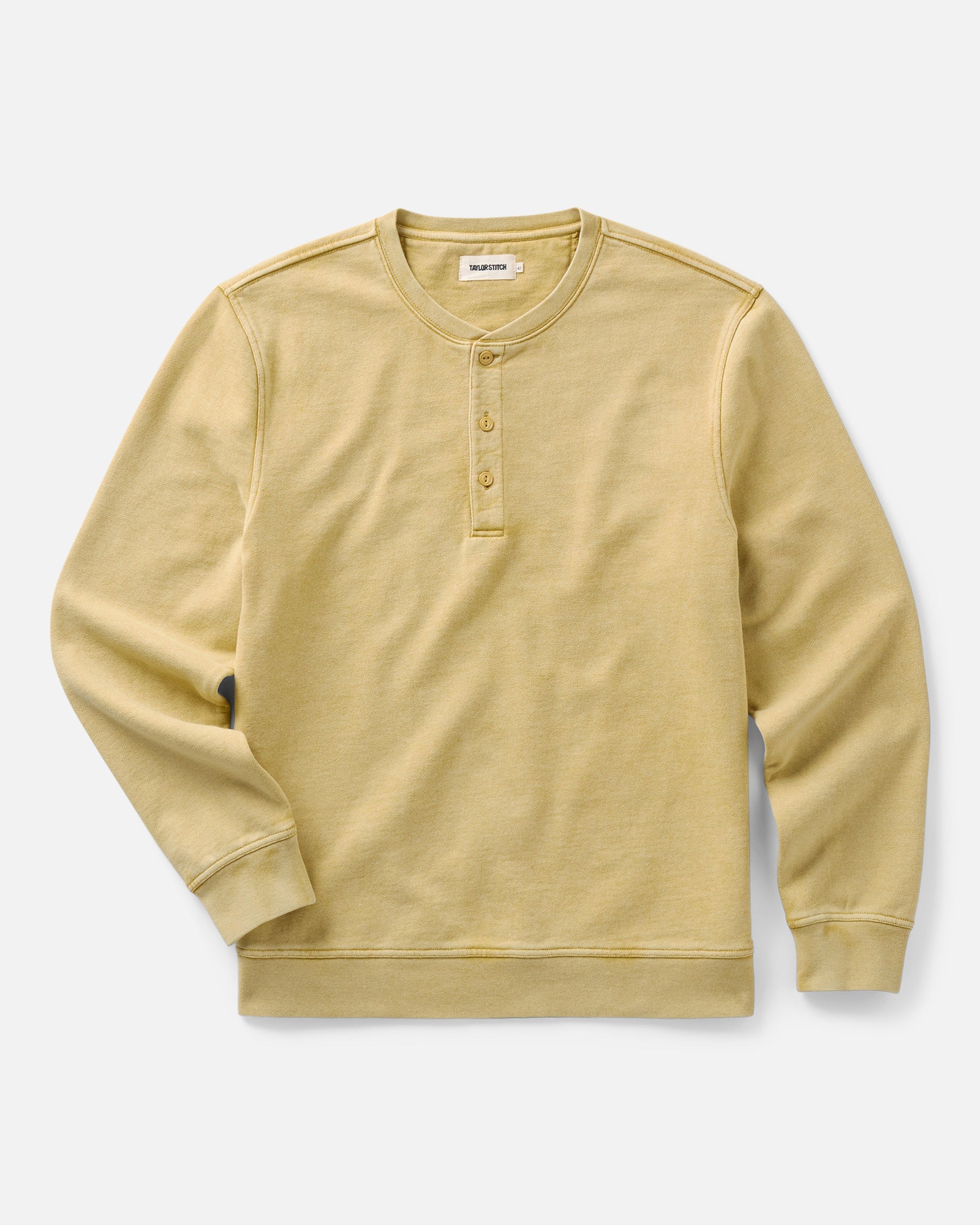 flatlay of The Sunset Henley in Washed Goldfinch Terry, Knits by Taylor Stitch