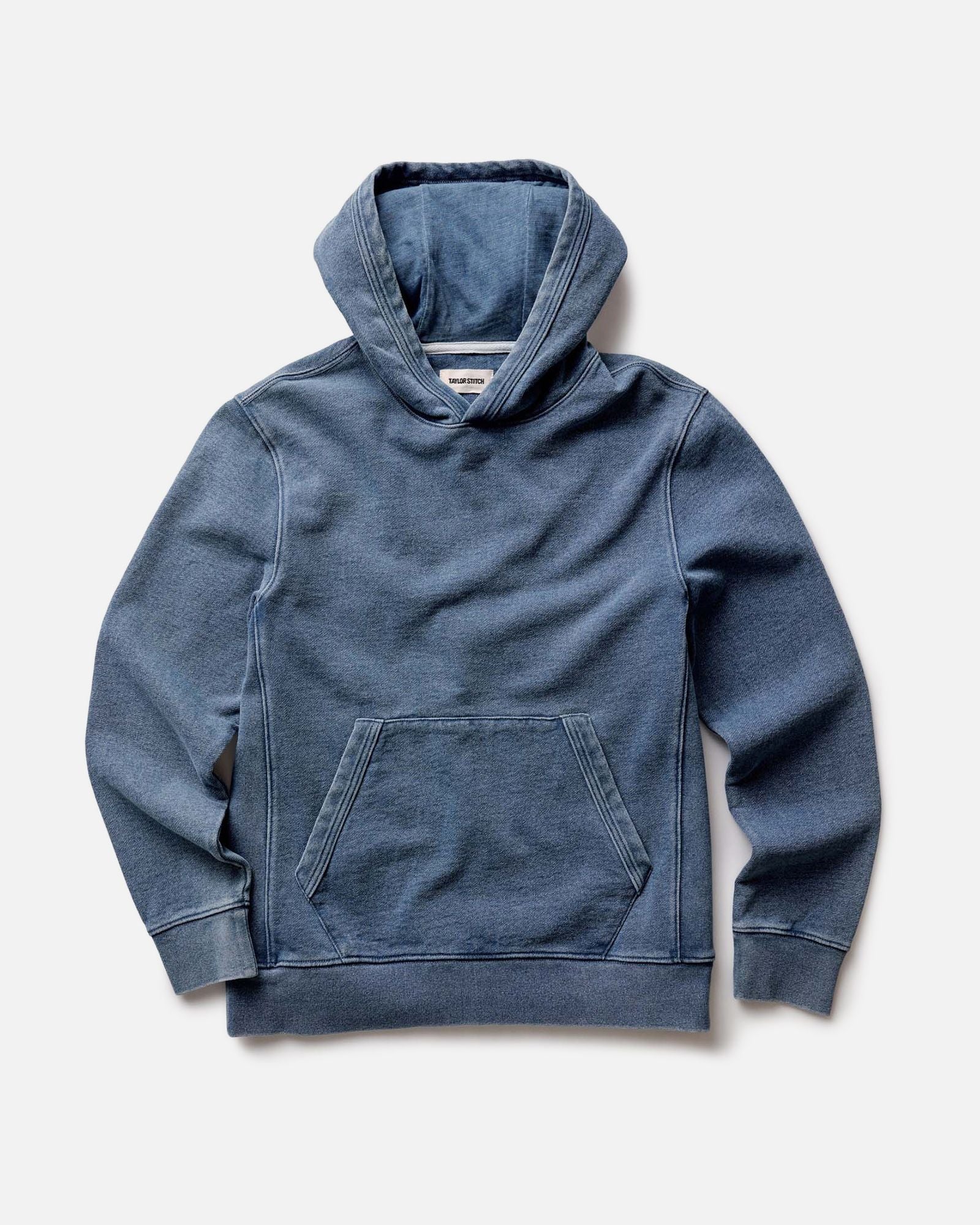 flatlay of The Apres Hoodie in Washed Indigo Terry, Knits by Taylor Stitch
